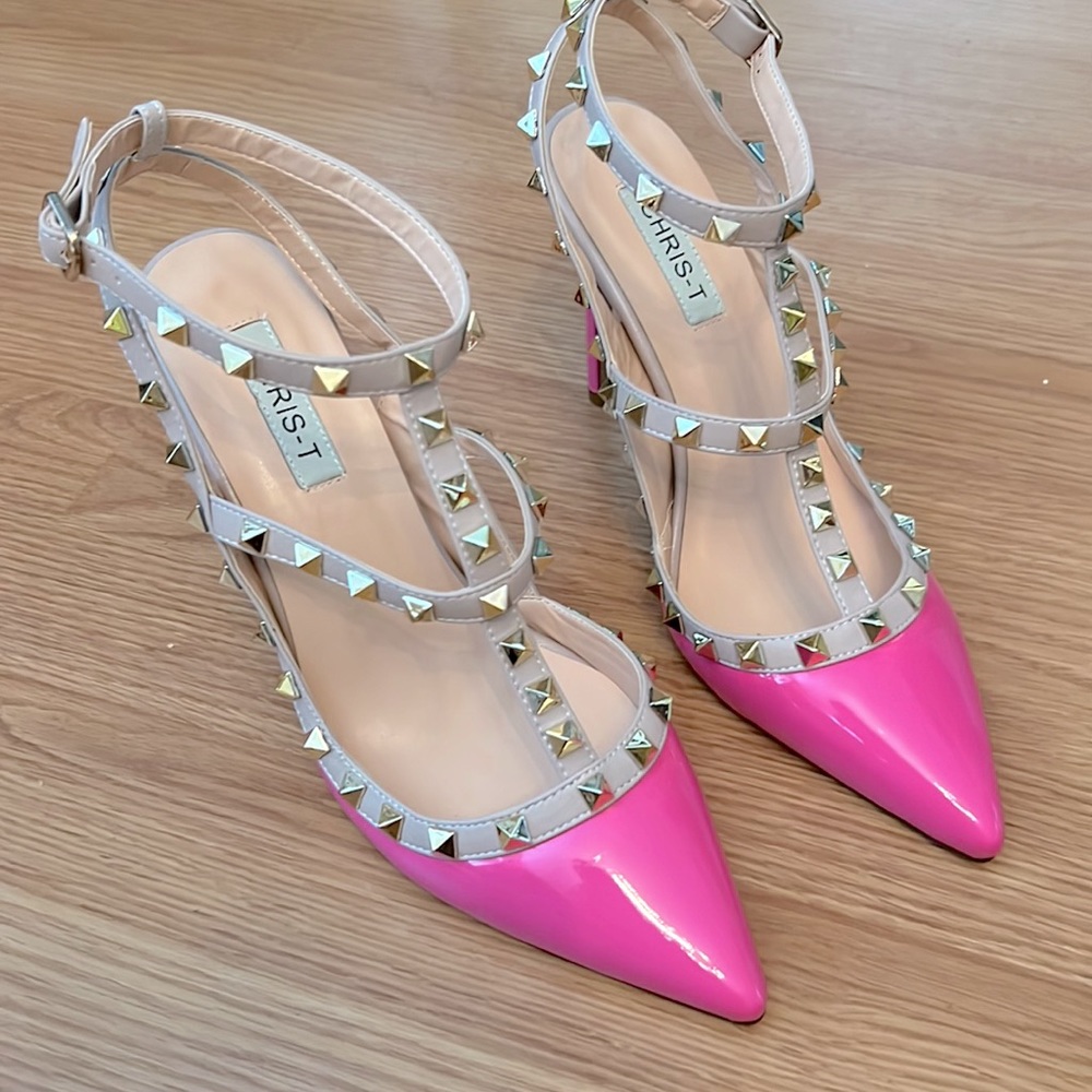 Brand new!! Hot hot pink with gold studs!